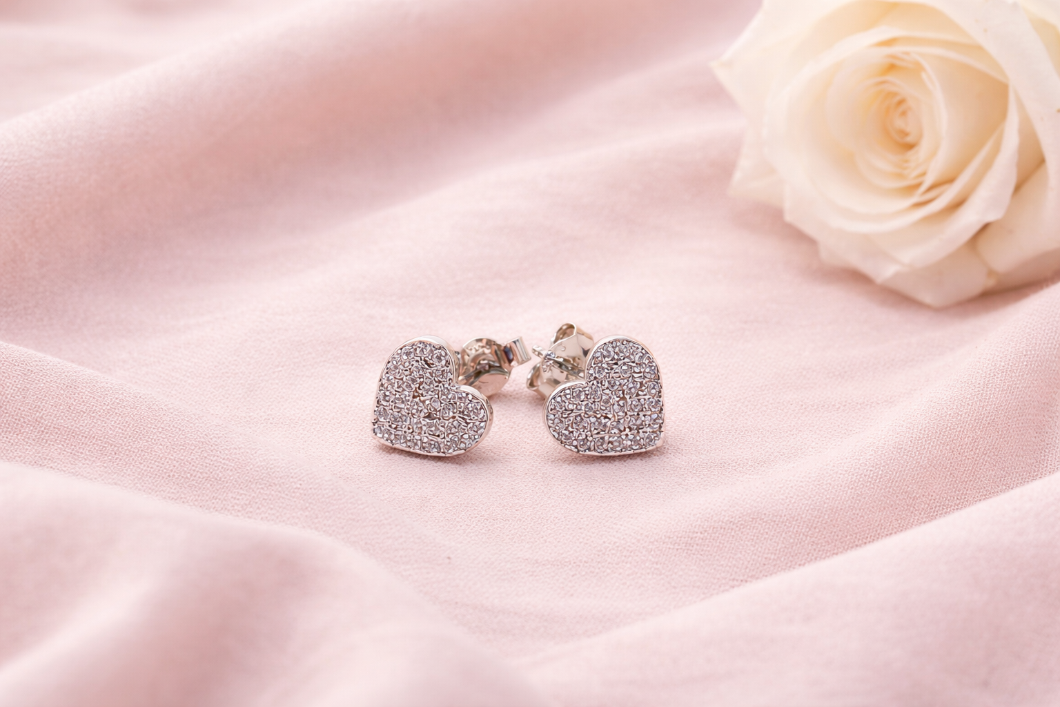 Silver Heart Shape Stud Earrings - Designed to catch the light — and the attention.
