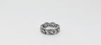 Silver ring with intricate design 
