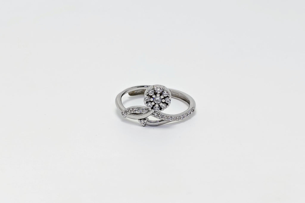 Silver ring with a small diamond