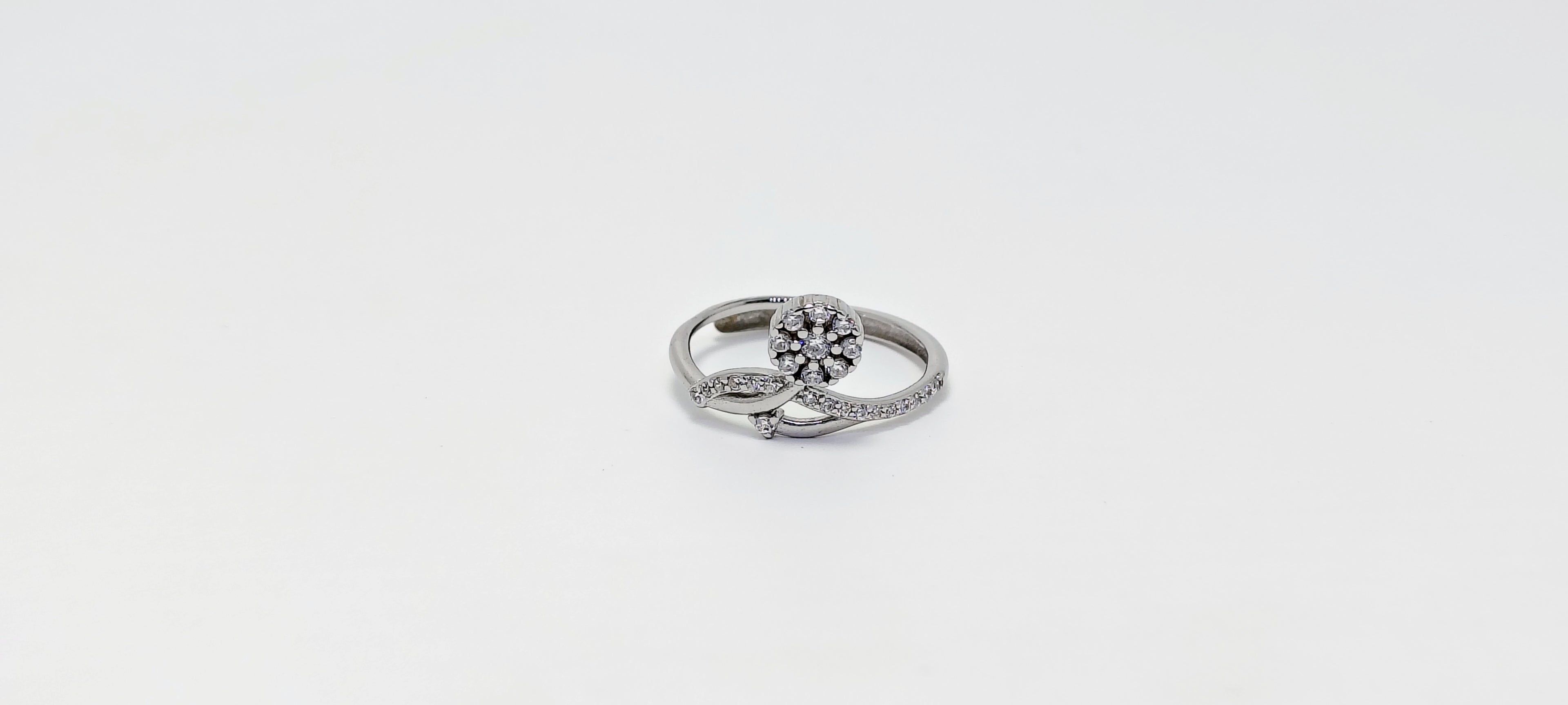 Silver ring with a small diamond