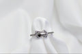 Silver ring with a black gemstone 