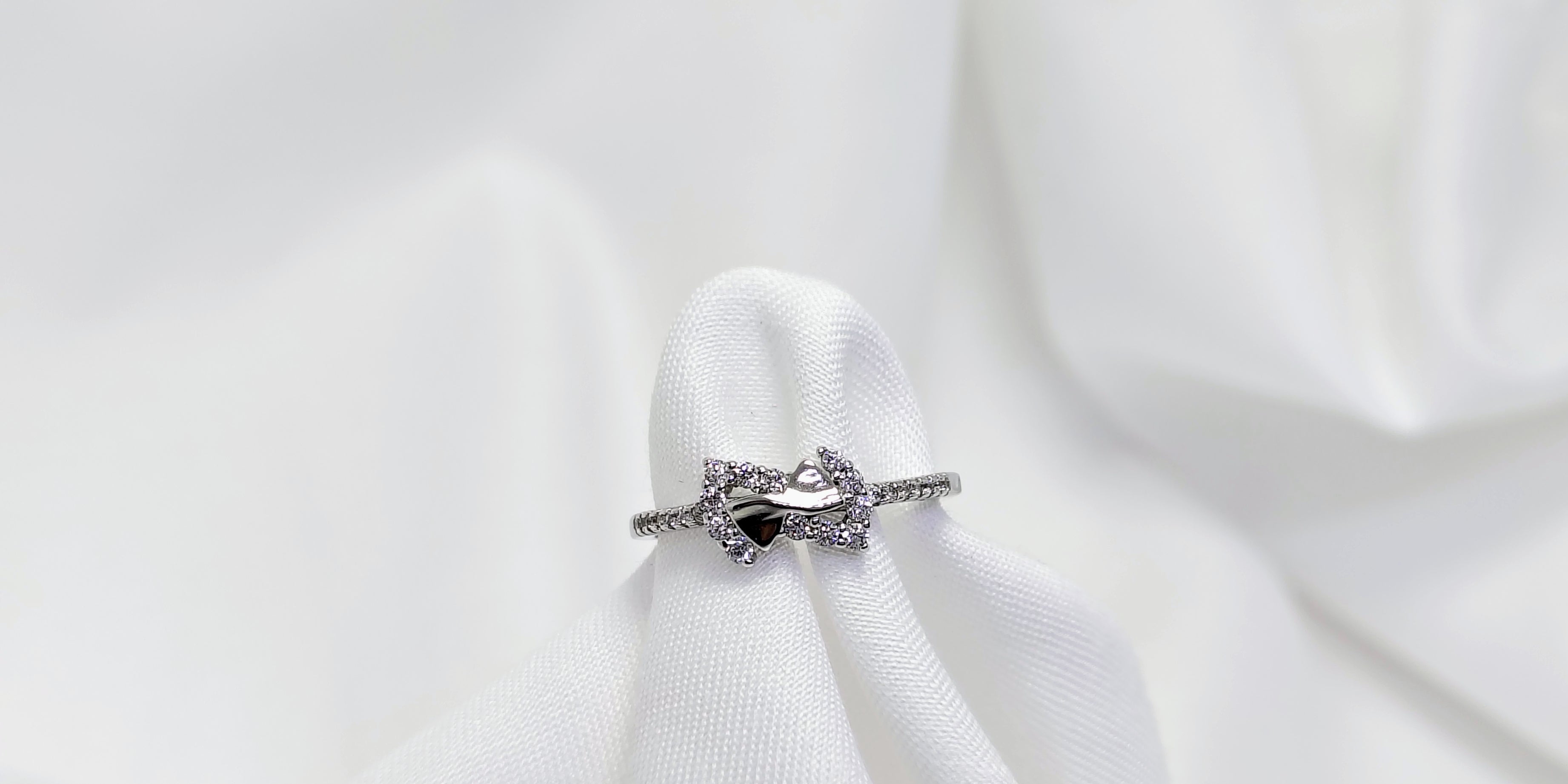 Silver ring with a black gemstone 