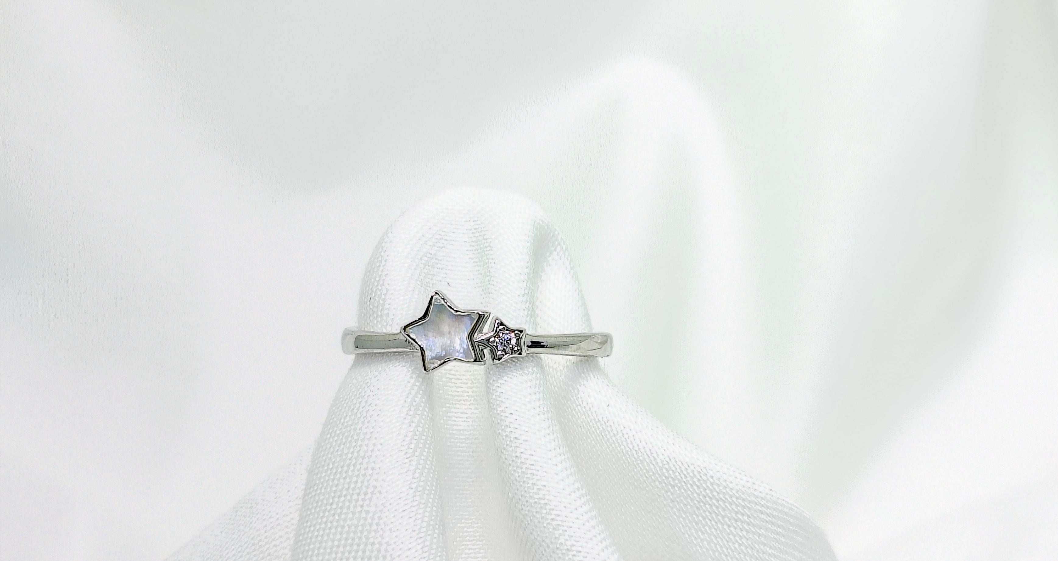 Silver star-shaped ring 