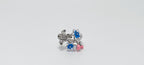Silver earring with blue and pink accents on a white background