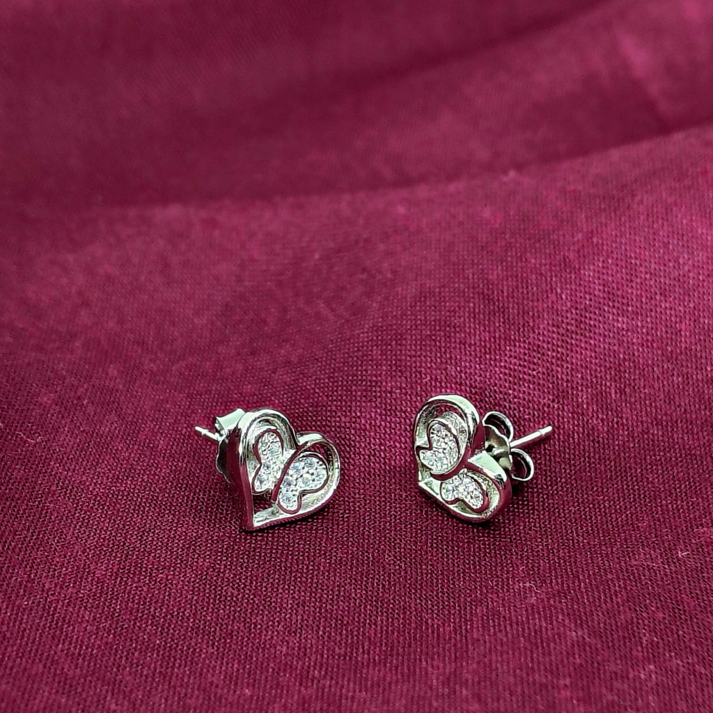 Silver Heart and Butterfly Everyday Stud Earrings - Designed to catch the light — and the attention.