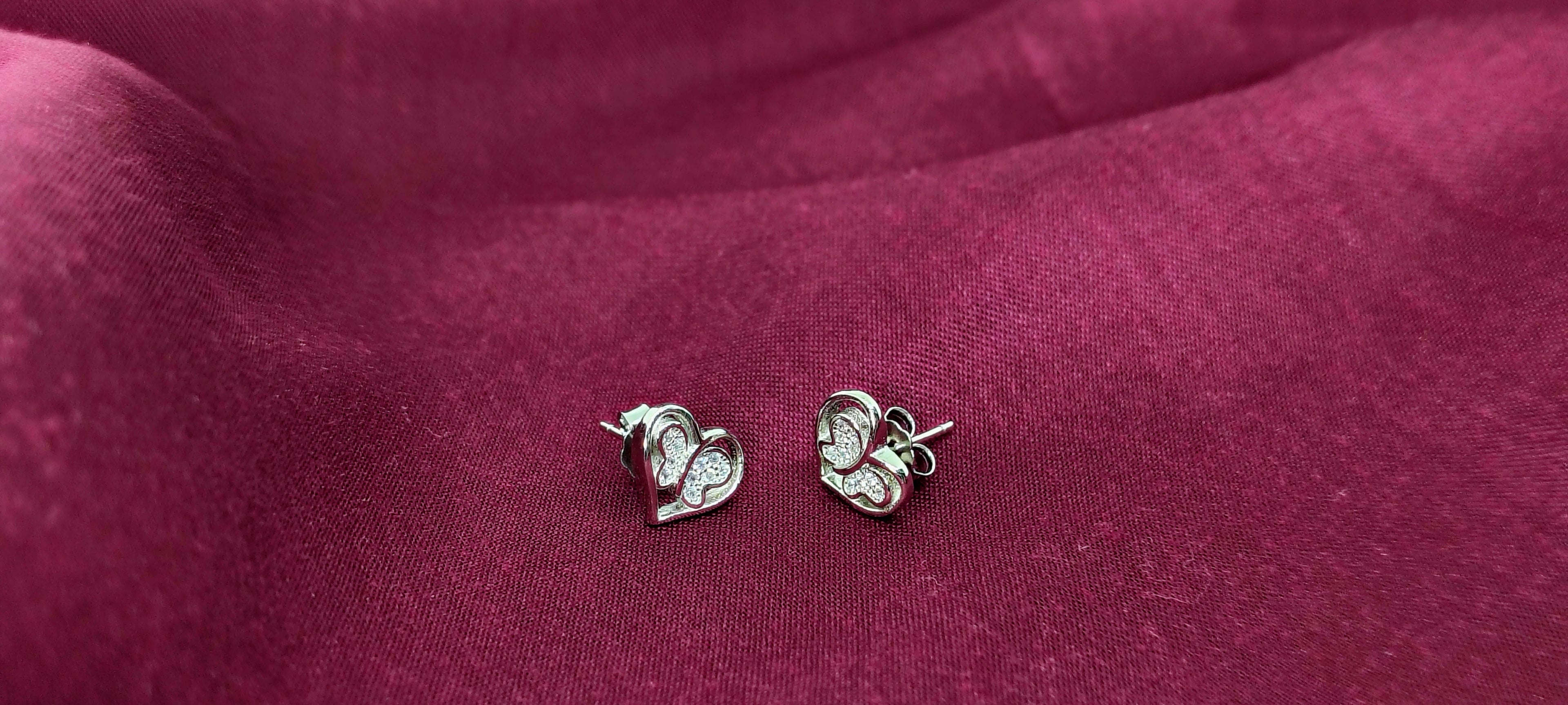 Silver Heart and Butterfly Everyday Stud Earrings - Designed to catch the light — and the attention.