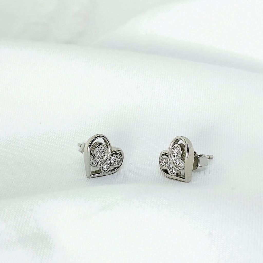 Silver Heart and Butterfly Everyday Stud Earrings - Designed to catch the light — and the attention.
