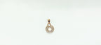 RoseGold Color pendant with a circular design 