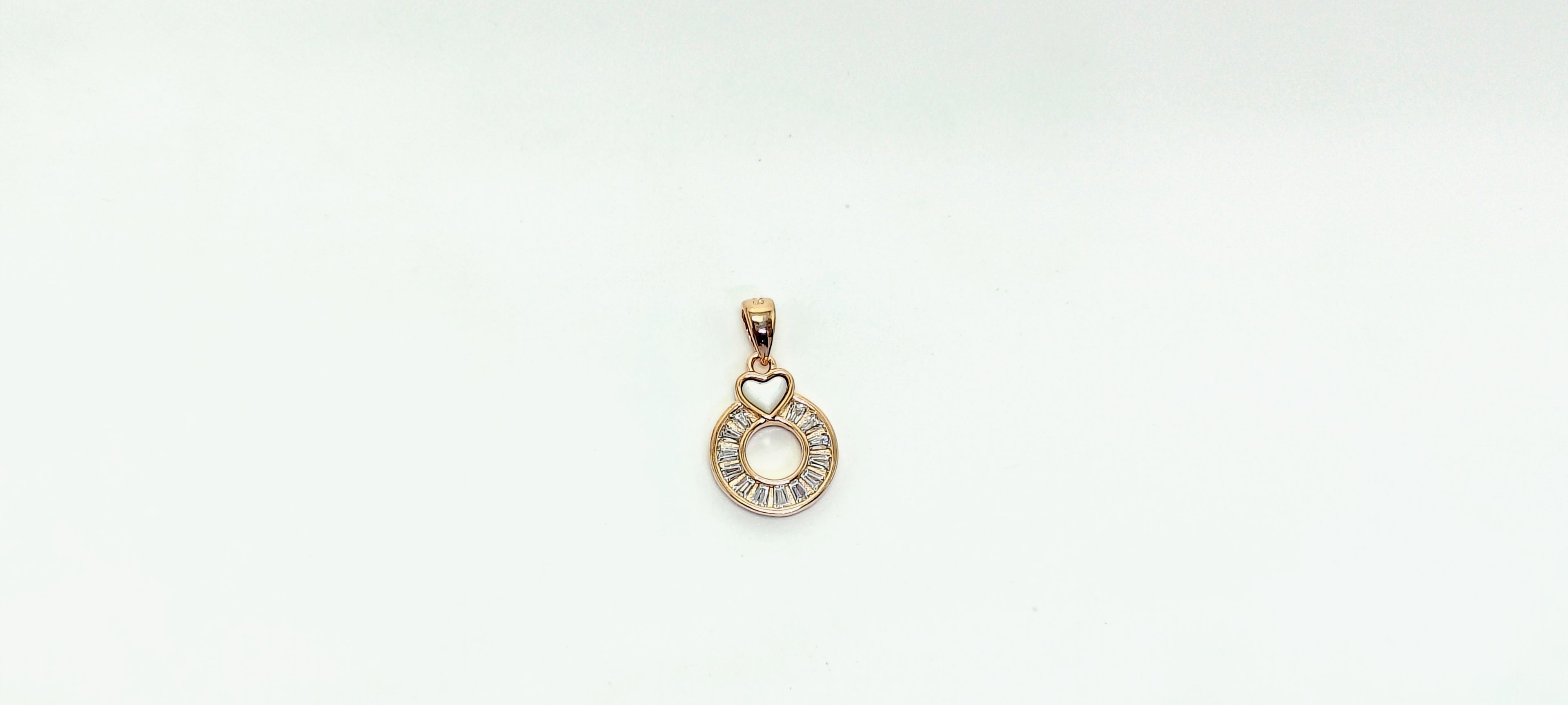 RoseGold Color pendant with a circular design 