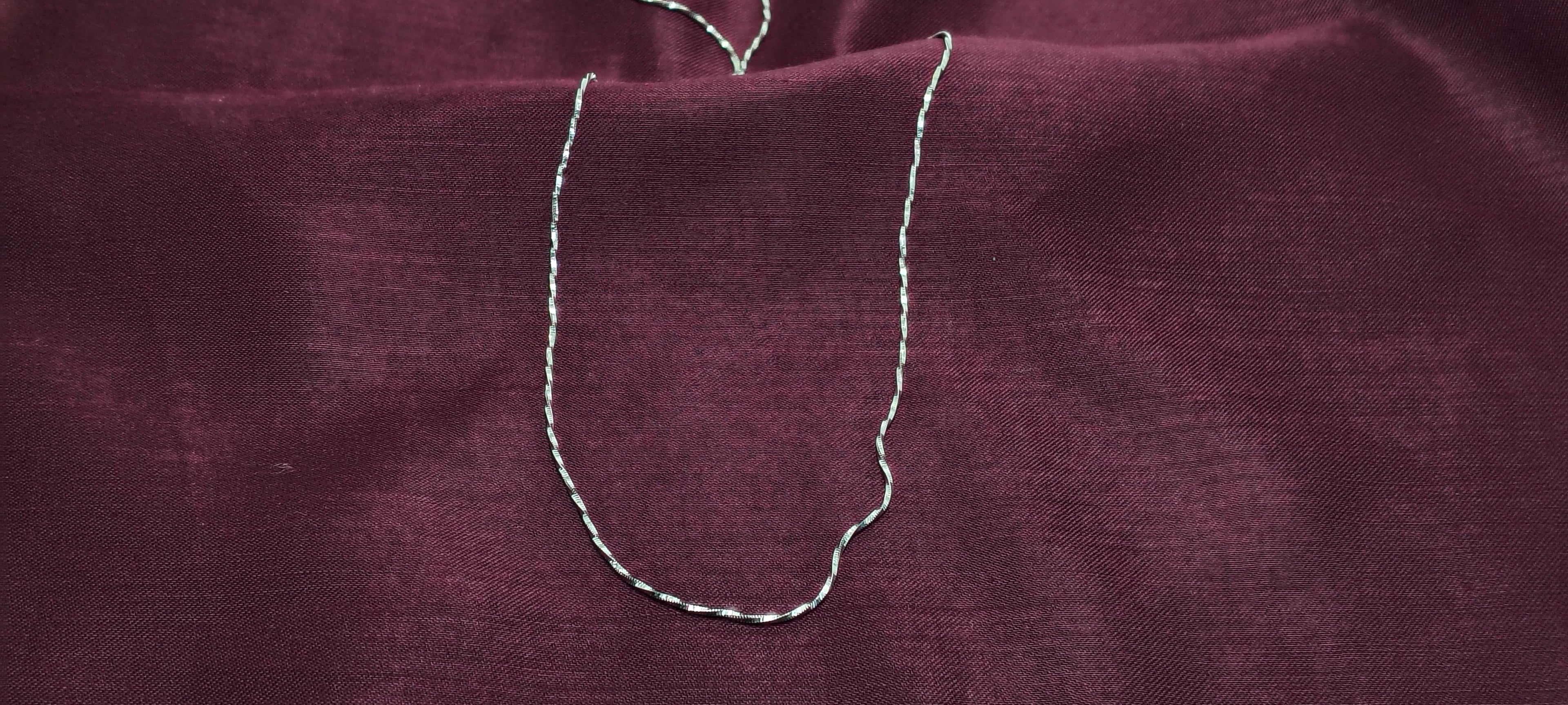 Elegant Everyday Twisted Silver Chain - When the lights dim and the music rises, this piece catches every glow.